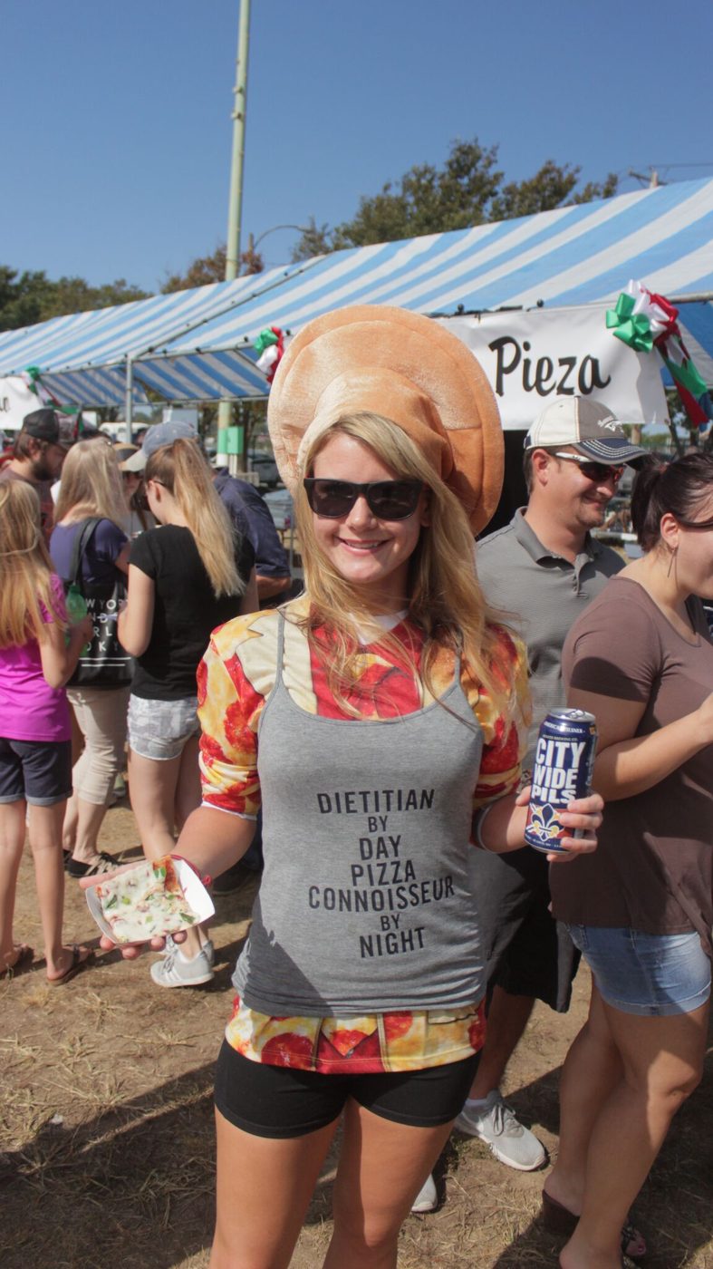 Festivalgoer in a pizza-themed outfit at the STL Square Off Pizza Festival