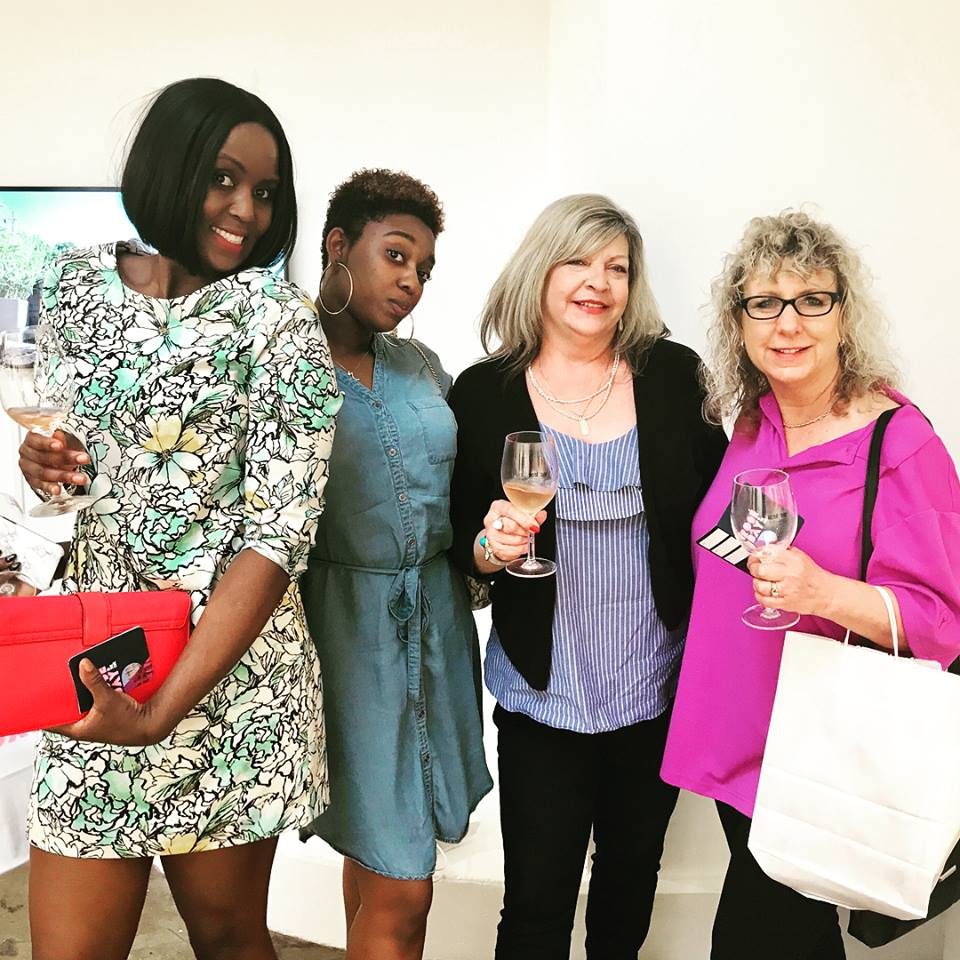 Four women with rosé glasses at Rosé Day